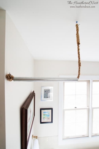 3. Rope: Use a length of rope to suspend your curtains from the ceiling or a wall-mounted hook for an industrial-chic look.