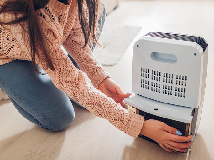 A dehumidifier can help cool a room by removing moisture from the air.