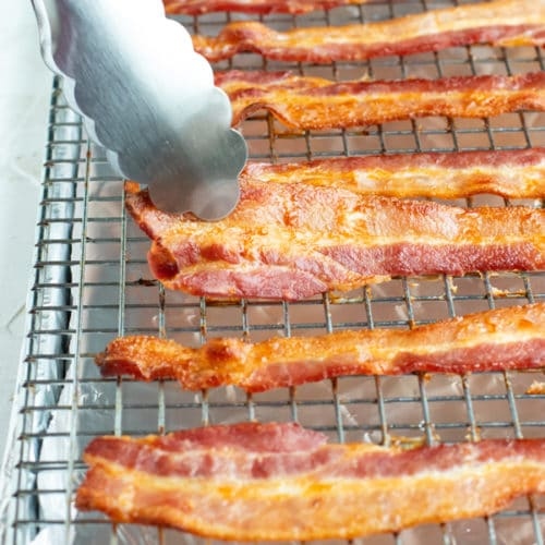 Bacon is best reheated in the oven, on a wire rack set over a baking sheet.
