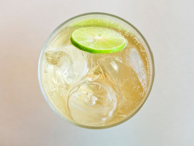 Club soda and ginger ale are both carbonated soft drinks that are often used as mixers for alcoholic beverages.