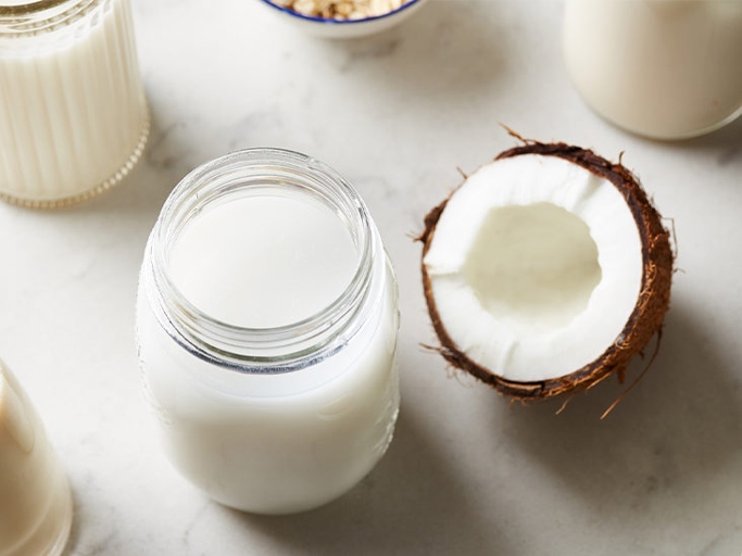 Coconut milk is made by blending the meat of a mature coconut with water and then straining it.
