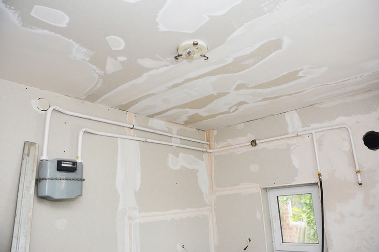 Drywall mud can be a pain to clean up, but using a vacuum can make the job a lot easier.