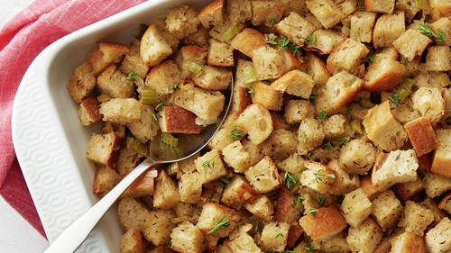 Herb-filled bread stuffing is a great way to use up leftover hamburger buns. This stuffing is packed with flavor and is sure to be a hit at your next holiday gathering.