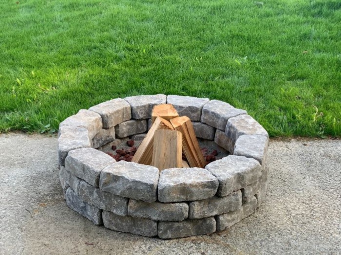 If you are using a fire pit on a patio or other surface that could be damaged by heat, it is important to put sand in the bottom of the fire pit.