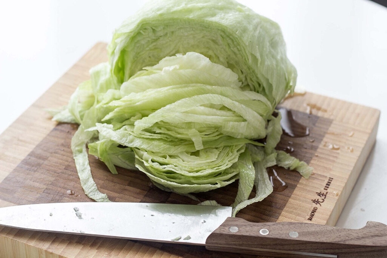 If you don't want your lettuce to turn into a soggy mess, make sure to cut out the core before washing it.