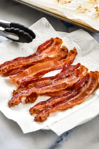 If your bacon grease is starting to solidify, reheat it on the stove until it liquefies again.