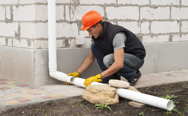 In the event of an unexpected rainfall, handle the situation by rolling up the downspouts.