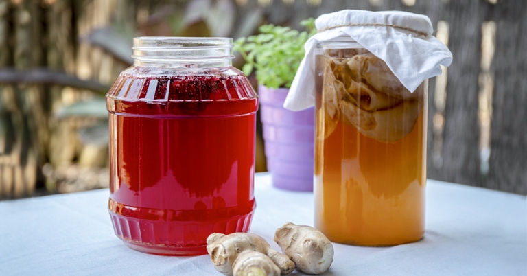 Kombucha is a fermented tea that contains a small amount of caffeine, which may keep you awake if you drink too much.