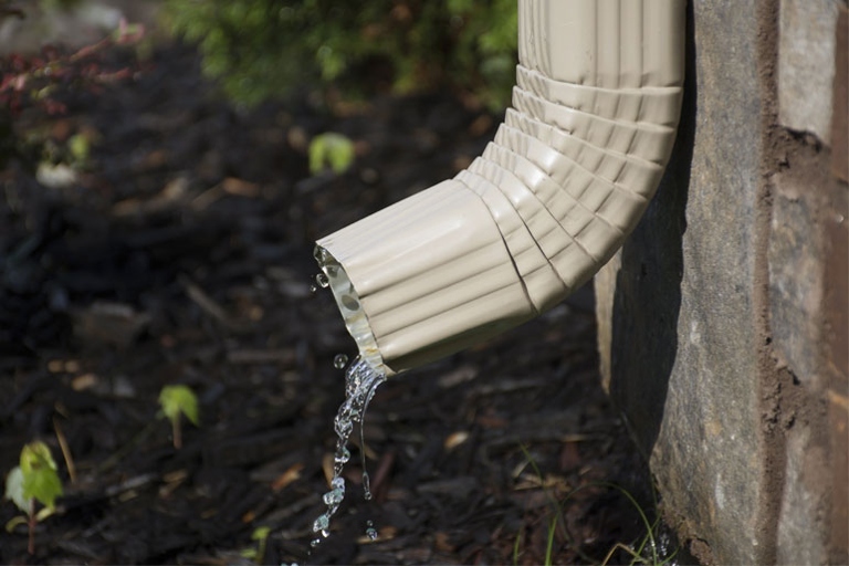 One possible solution is to check the downspout for any blockages that might be causing the vibration.
