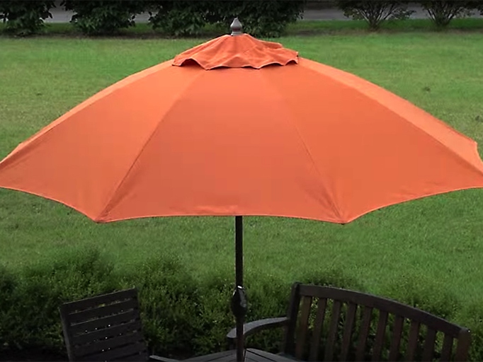 One way to give your patio umbrella new life is to use the faded canopy as a template to create a new one.