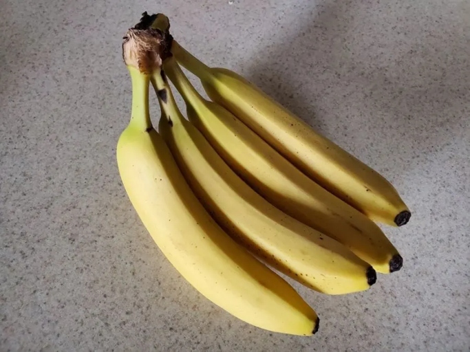 One way to keep fruit flies away from bananas is to keep your kitchen clean and dry.