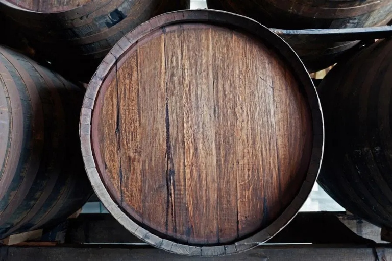One way to keep wine barrels from shrinking is to store them in a humidity-controlled environment.