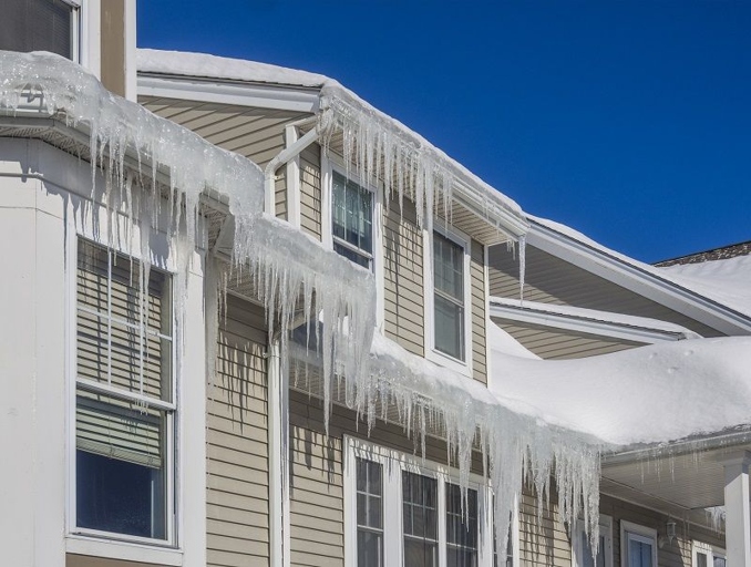 One way to prevent icicles from forming on your gutters is to enhance the insulation of your home and attic.