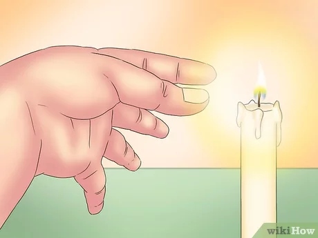 One way to put out a candle is to use your fingers.