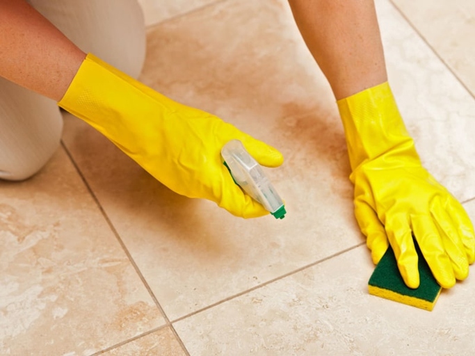 Sugar water is an easy and effective way to soften grout for removal.