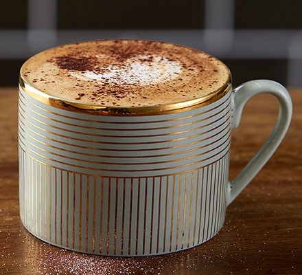 The chocolate powder is the key to a great cappuccino.