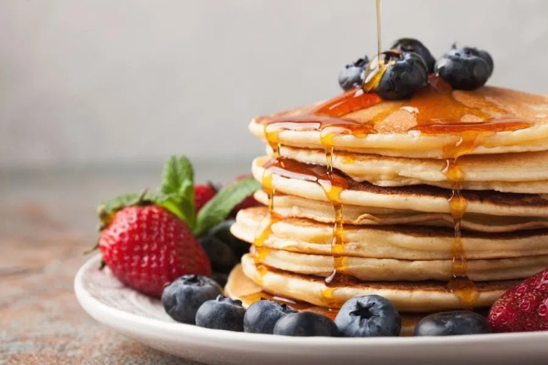 The fiber in pancakes can cause digestive issues and make you feel the need to poop.