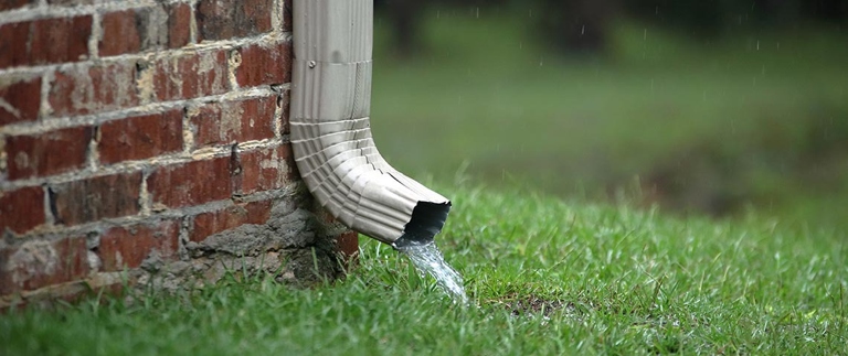The most common solution to a vibrating downspout is to simply shorten it.