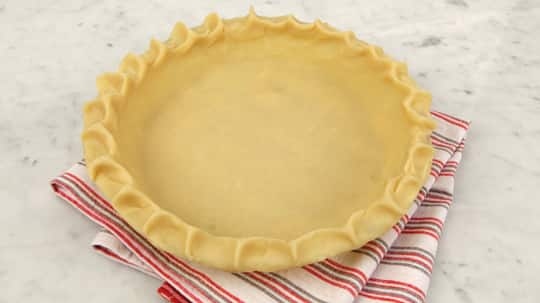 To keep a pie crust from getting soggy, don't poke holes in the pastry.