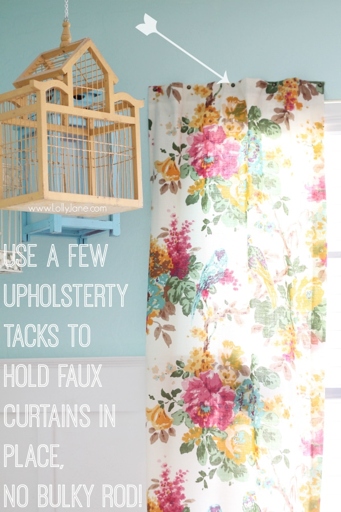 Upholstery tacks can be used to hang curtains without a rod.