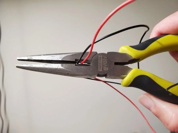 Use tin snips to cut wire without a wire cutter.