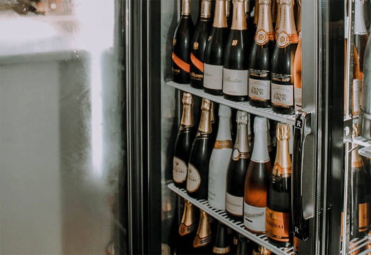 You can store champagne in a wine fridge, but only for a short time.